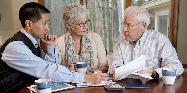 Financial advisor with elderly couple
