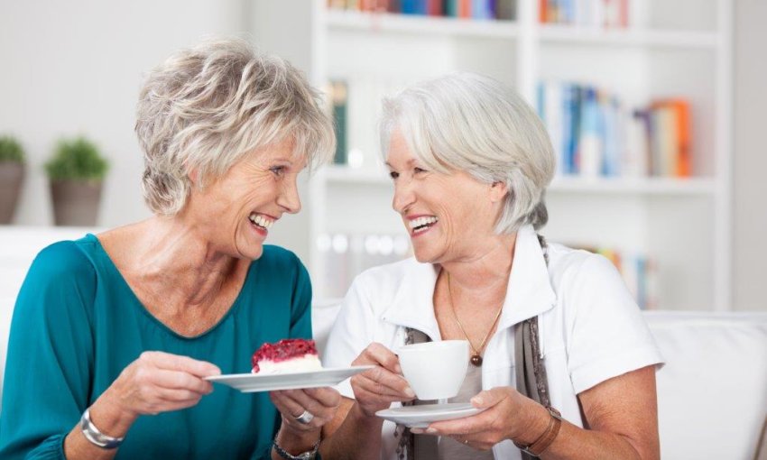 Happy Senior Ladies taking Coffee