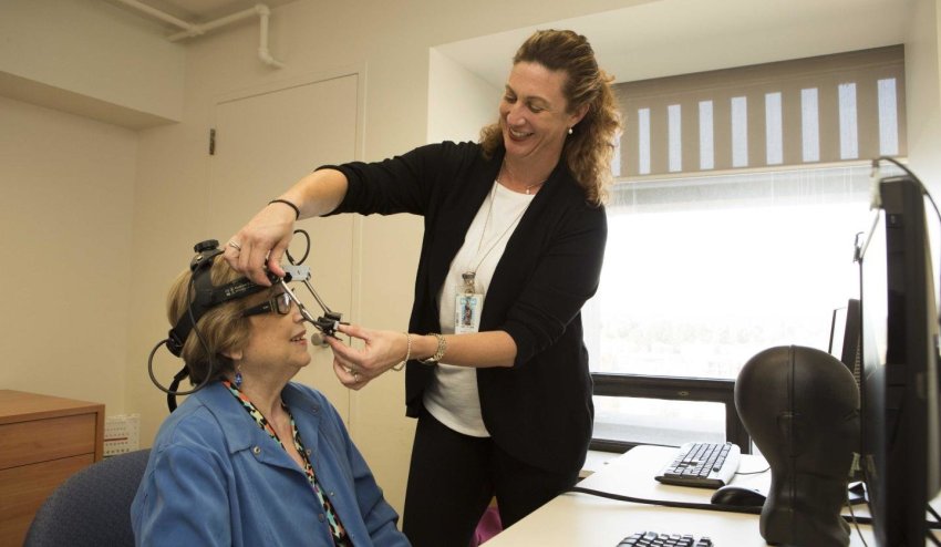 Jennifer Ryan adjusts eyetracker