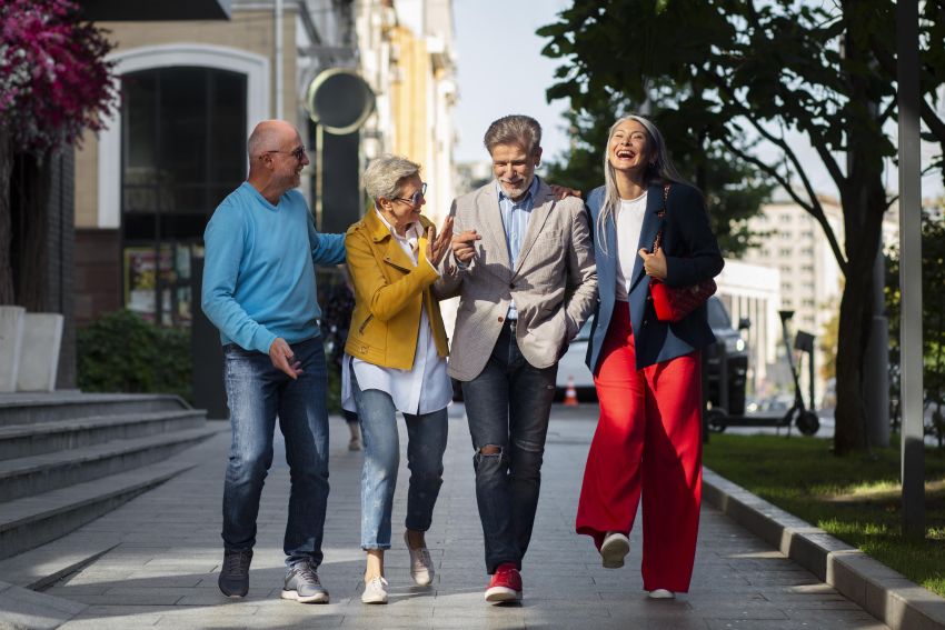 happy senior people fooling around