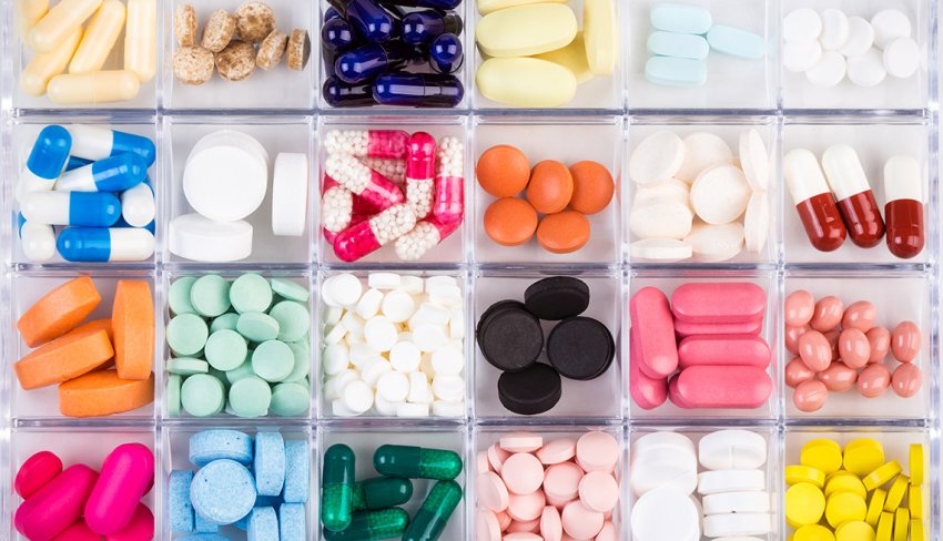 pills box with drugs and supplements