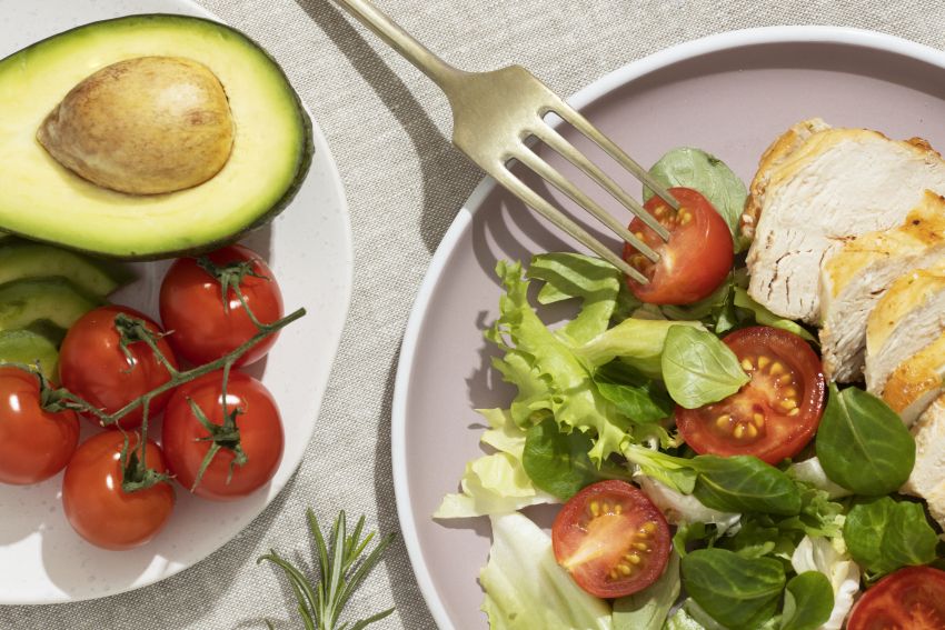plate with keto diet food tomatoes 