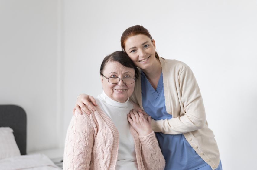 smiling women with caregiver