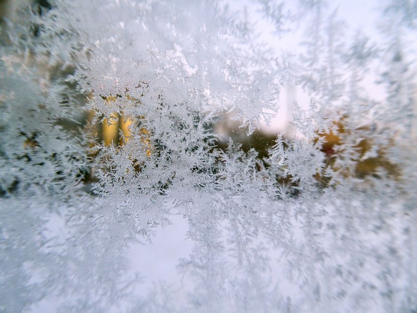 snowflakes window freezing cold